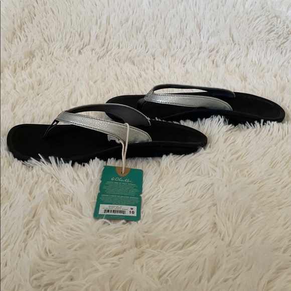 OluKai | Shoes | Olukai Silver Flip Flop Sandals | Poshmark